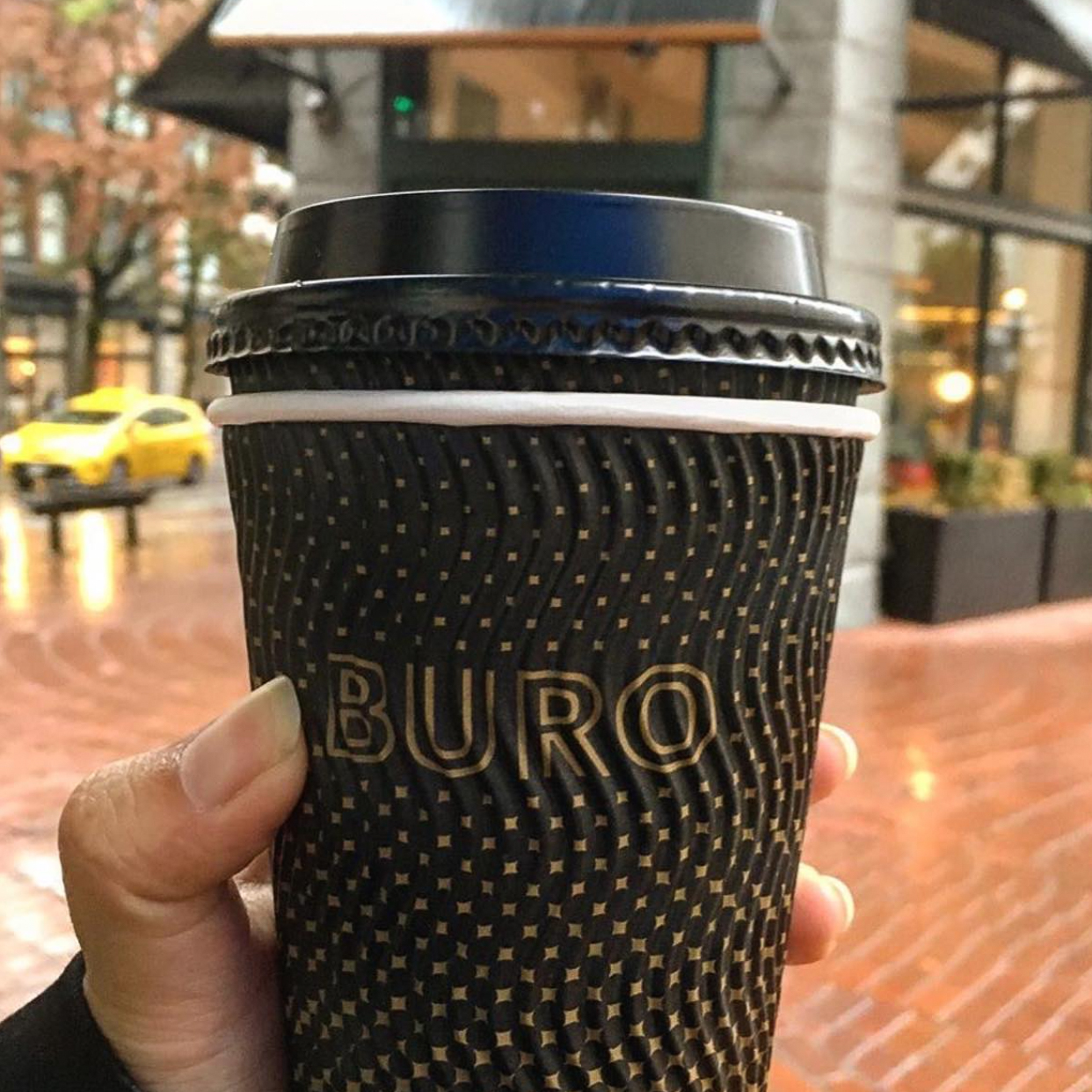 coffe cup in front of store